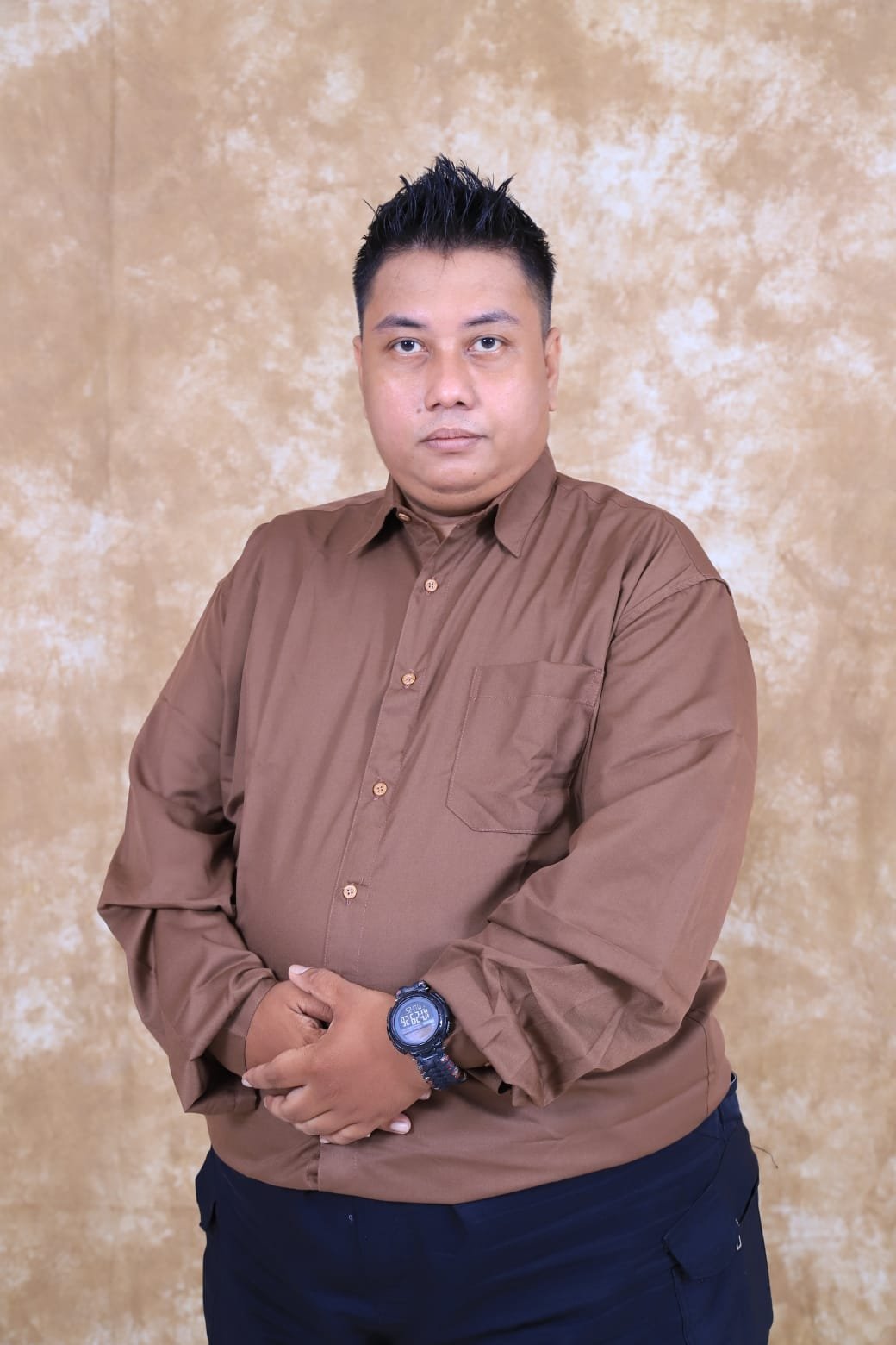 Budi Santoso, S.Kom